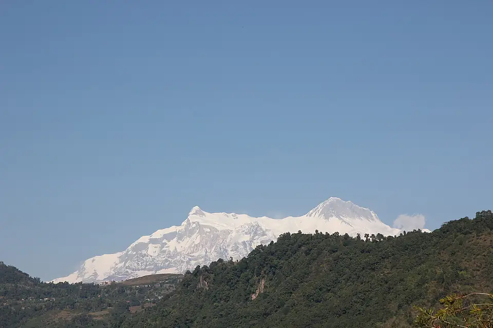 Annapurna II and IV behind hills