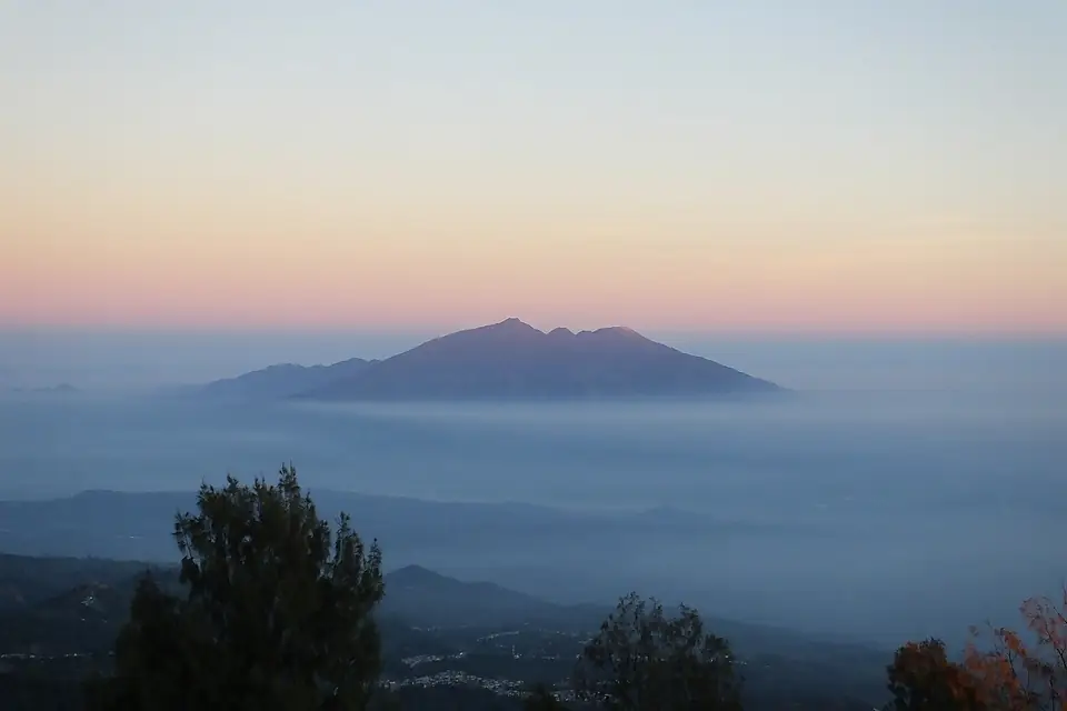Arjuna in fog from Mount Penanjakan 1