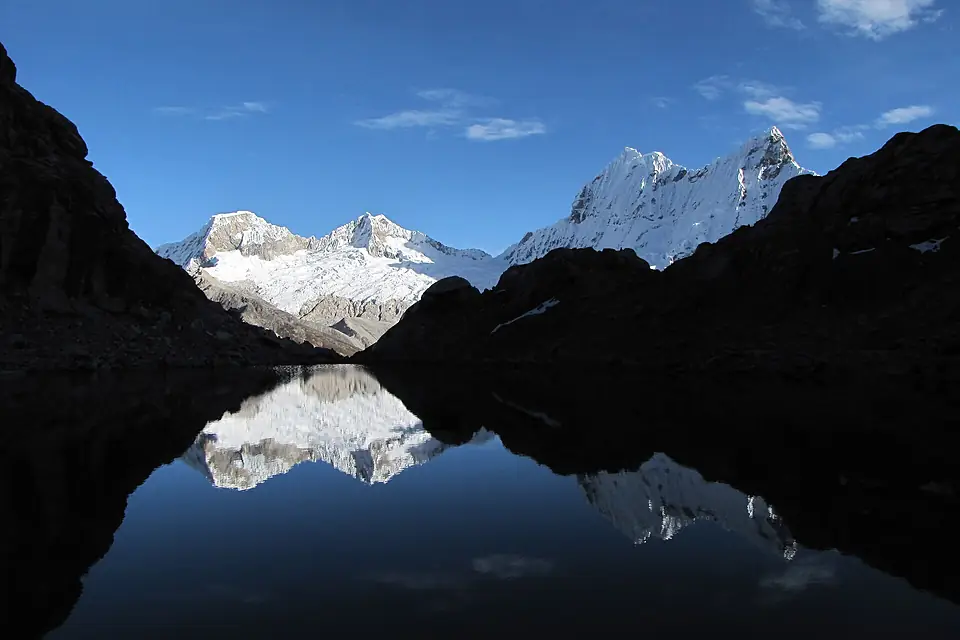 Pisco and Chacraraju reflection at Yanapaccha base camp (6020836415)